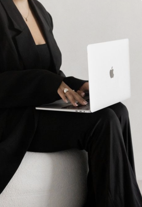 Working on a laptop, business content